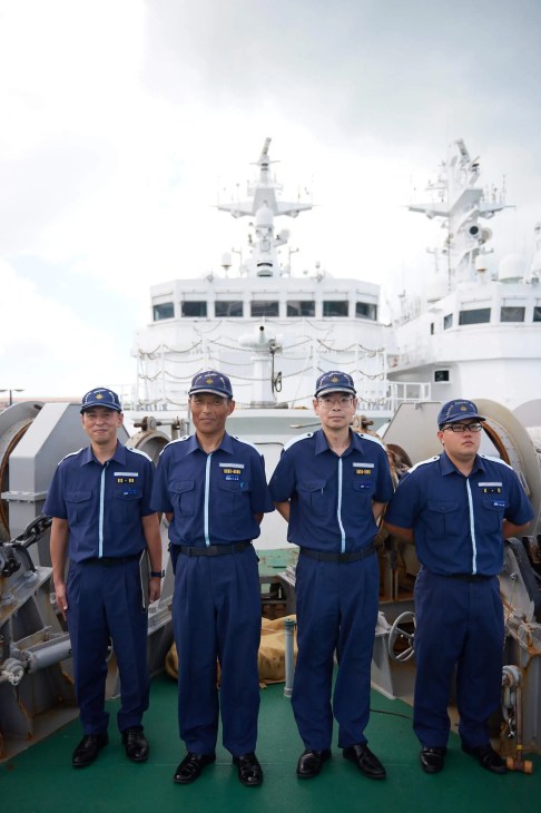 Captain Morimoto (second from left) with colleagues on board ‘Patrol Vessel Tarama’