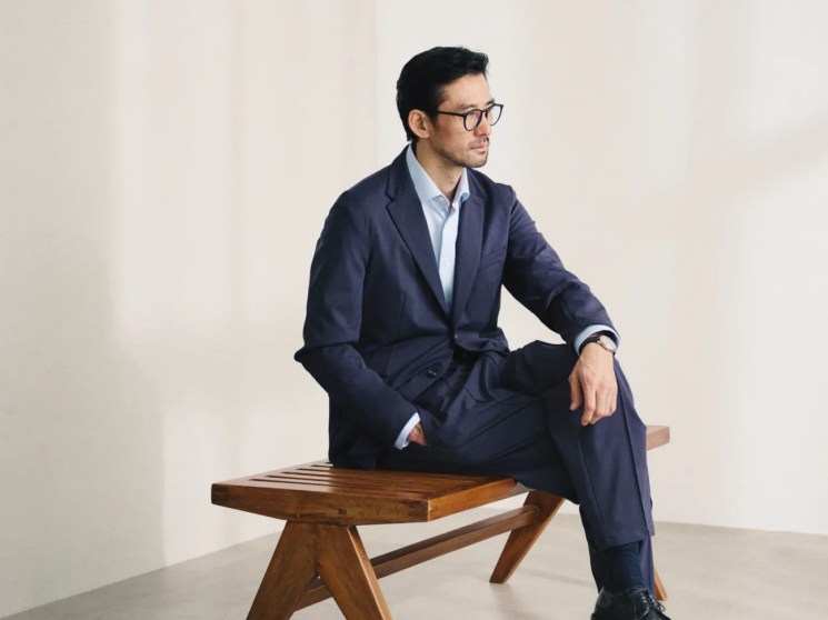 Jacket and trousers by Emporio Armani, shirt by Eton, socks by Tabio, shoes by Alden, glasses by Mykita, patrimony automatic watch by Vacheron Constantin