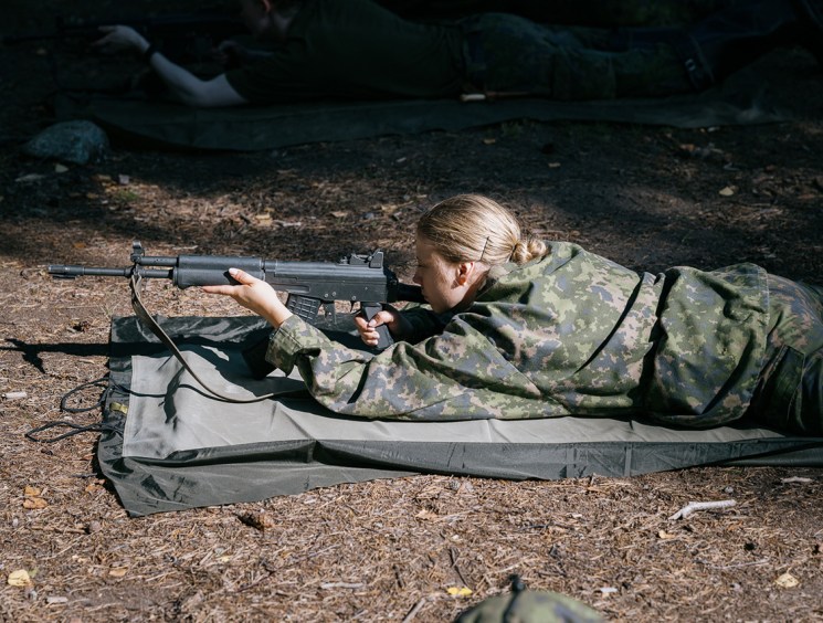 Why are Finns enlisting in the military?