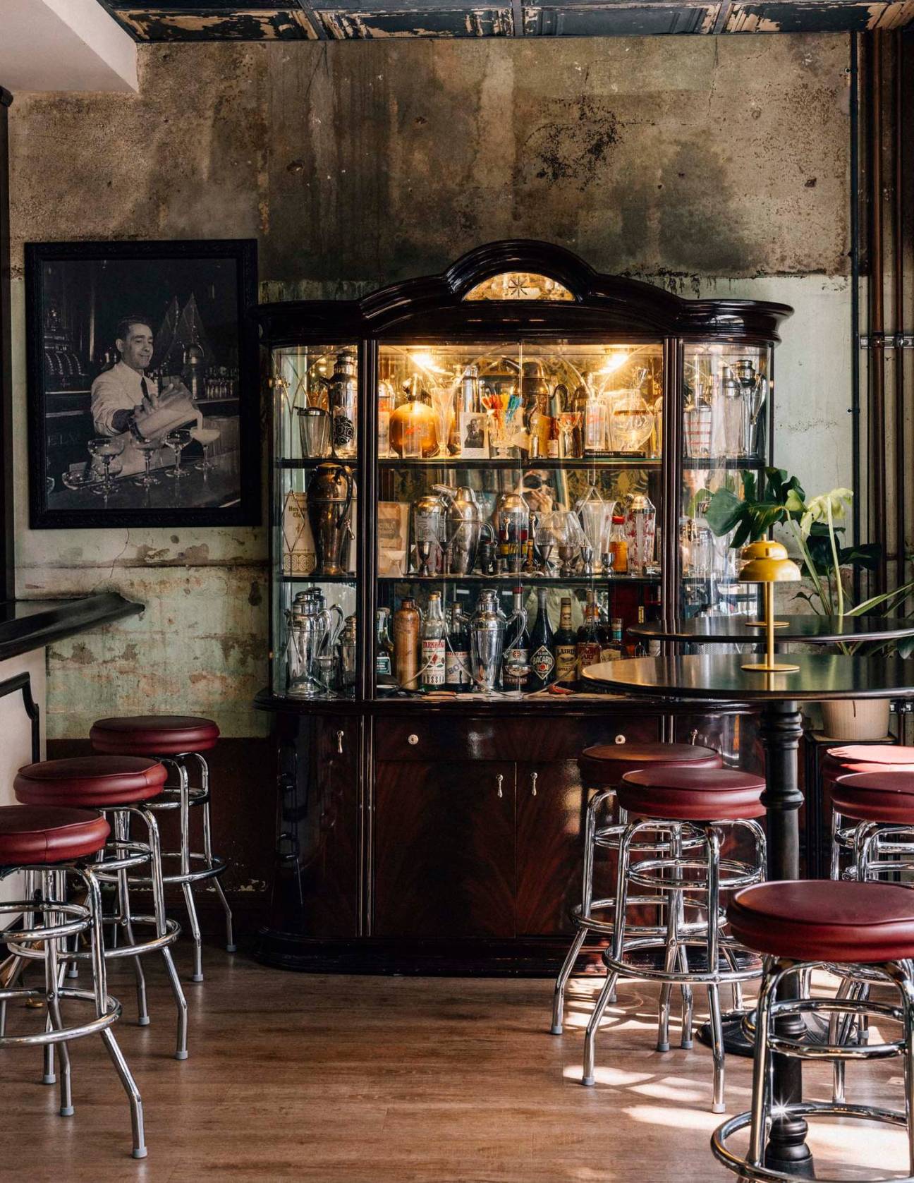 A drinks cabinet and bar stalls at Cafe La Trova.