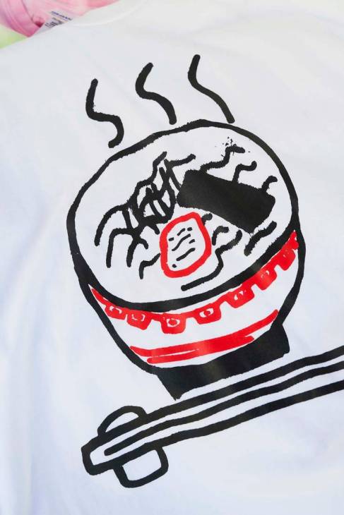 A t-shirt graphic showing a bowl of noodles.