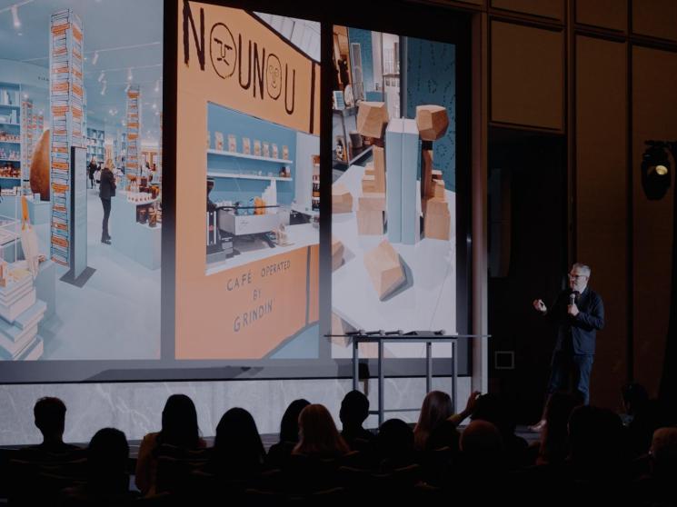 Tyler Brûlé presenting on stage.