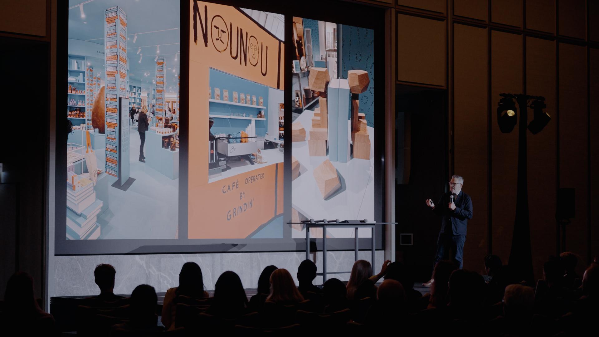 Tyler Brûlé presenting on stage.