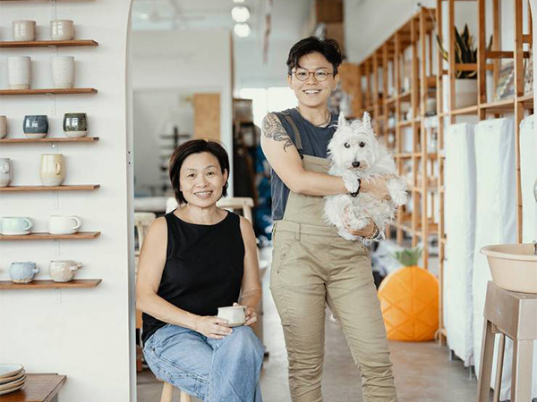 A portrait of Michelle Lim and Ng Seok Har.