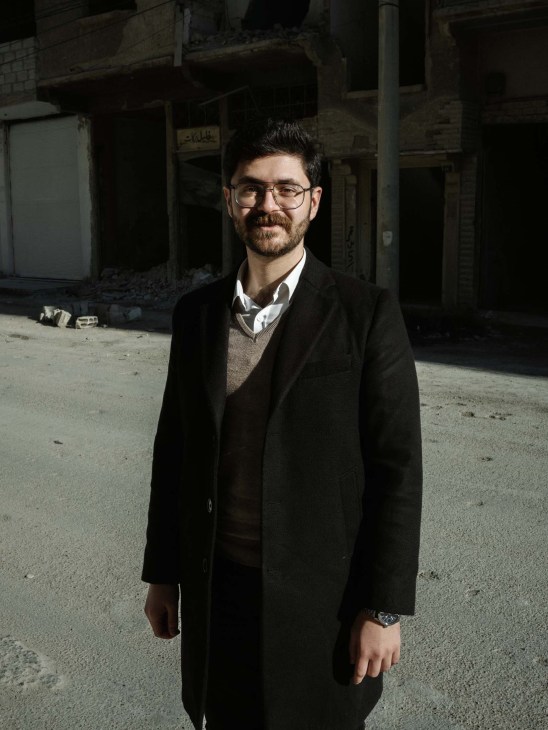 Syria, Damascus, 2025. Humam Daaboul, outside his family home in Darayya.