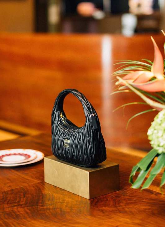A Miu Miu handbag.