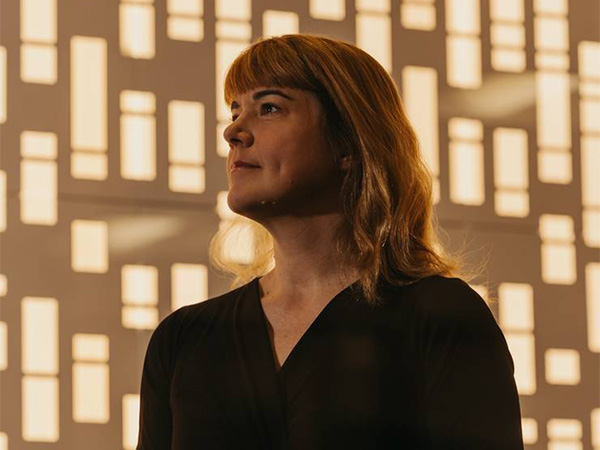 A portrait of Dr Amy Kruse.