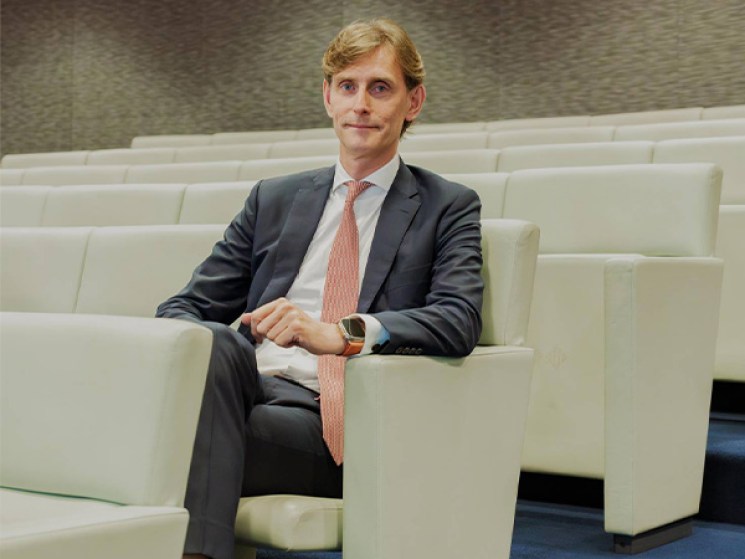 A portrait of Neil Macleod.