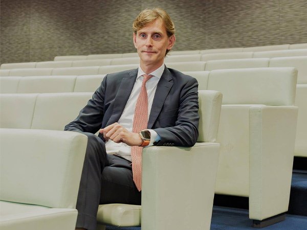 A portrait of Neil Macleod.