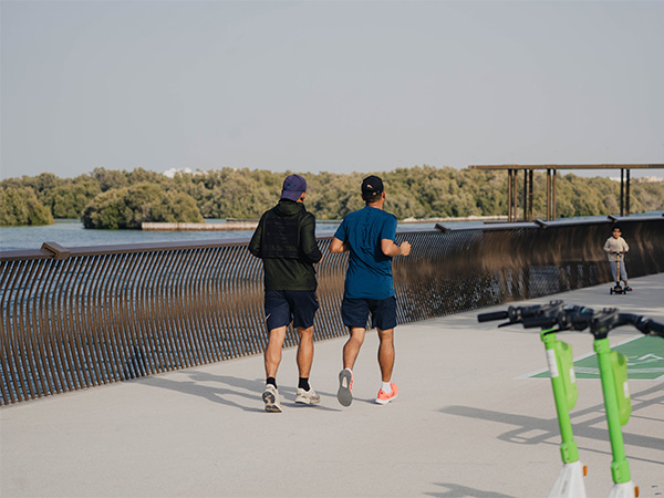 Men running in Abu Dhabi.