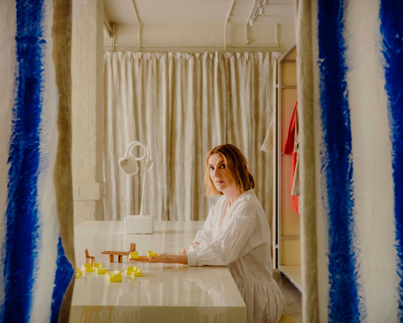 Toogood with miniature models of her Bread and Butter collection for Tacchini