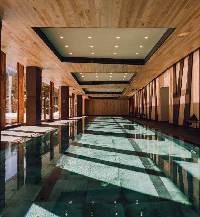An indoor swimming pool at Aethos Monterosa.