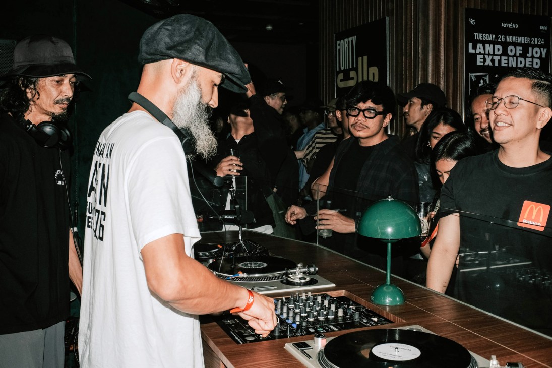A DJ mixing at Club 45 Radio Bar