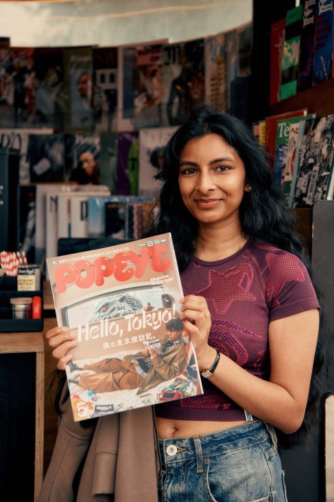 Woman holding magazine