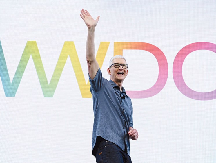 Tim Cook, chief executive officer of Apple Inc., during the Apple Worldwide Developers Conference (WWDC) at Apple Park campus in Cupertino, California, US, on Monday, June 9, 2025. Apple Inc. unveiled a new operating system interface called Liquid Glass at its annual Worldwide Developers Conference, calling it the company's broadest design update ever. Photographer: David Paul Morris/Bloomberg via Getty Images