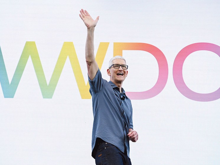 Tim Cook, chief executive officer of Apple Inc., during the Apple Worldwide Developers Conference (WWDC) at Apple Park campus in Cupertino, California, US, on Monday, June 9, 2025. Apple Inc. unveiled a new operating system interface called Liquid Glass at its annual Worldwide Developers Conference, calling it the company's broadest design update ever. Photographer: David Paul Morris/Bloomberg via Getty Images