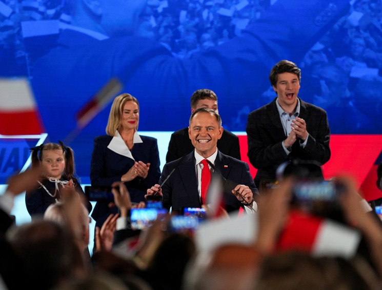 Polish presidential candidate Karol Nawrocki, backed by the main opposition Law and Justice (PiS) party, reacts to the exit polls of the second round of presidential election, in Warsaw, Poland, June 1, 2025. REUTERS/Aleksandra Szmigiel