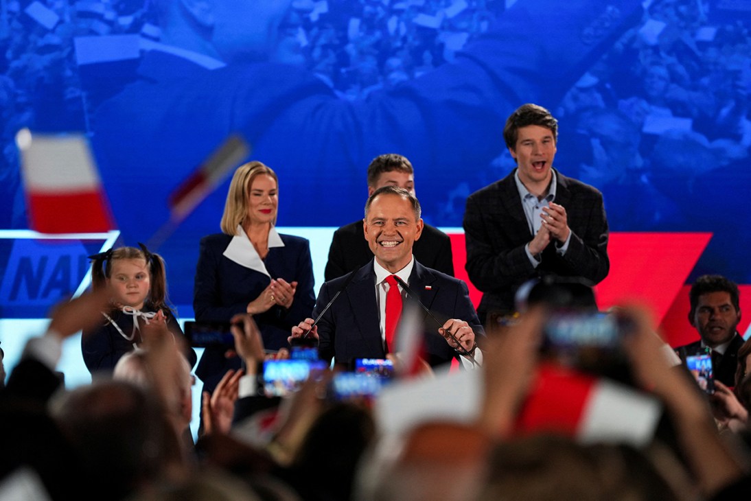 Polish presidential candidate Karol Nawrocki, backed by the main opposition Law and Justice (PiS) party, reacts to the exit polls of the second round of presidential election, in Warsaw, Poland, June 1, 2025. REUTERS/Aleksandra Szmigiel