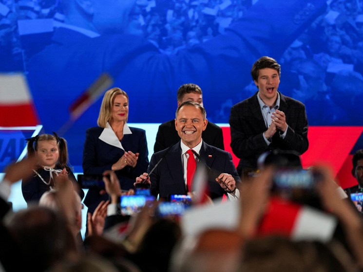Polish presidential candidate Karol Nawrocki, backed by the main opposition Law and Justice (PiS) party, reacts to the exit polls of the second round of presidential election, in Warsaw, Poland, June 1, 2025. REUTERS/Aleksandra Szmigiel