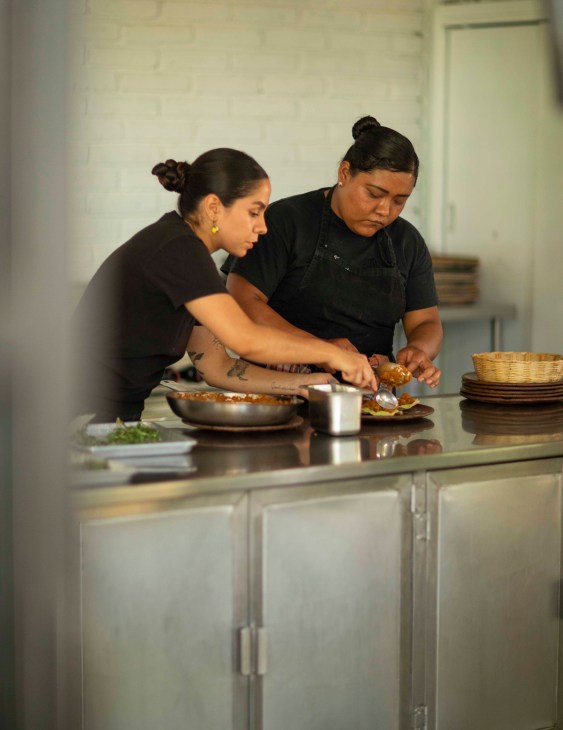 Preparing dishes at Alfonsina