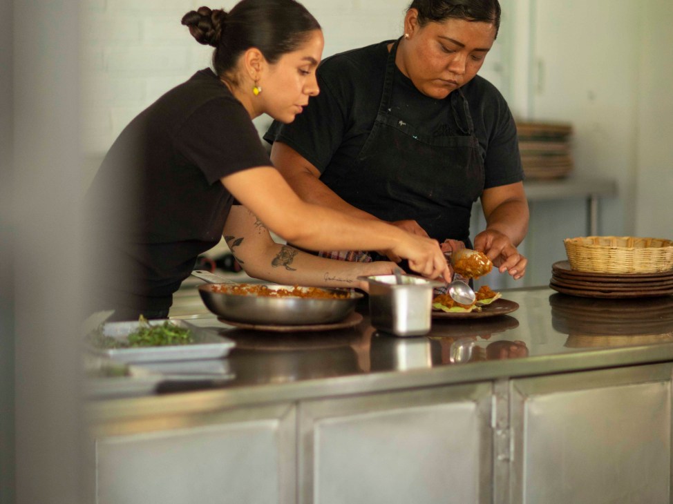 Preparing dishes at Alfonsina