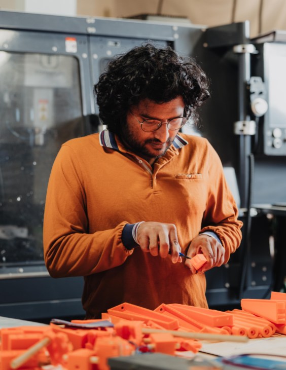 Senior mechanical engineer Harsha Reddy preparing test prints