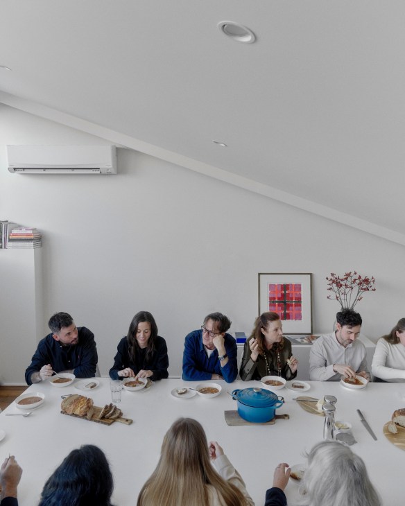 The team sitting around a table