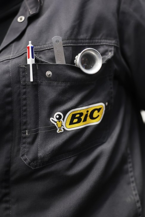 A bic pen in a worker's pocket