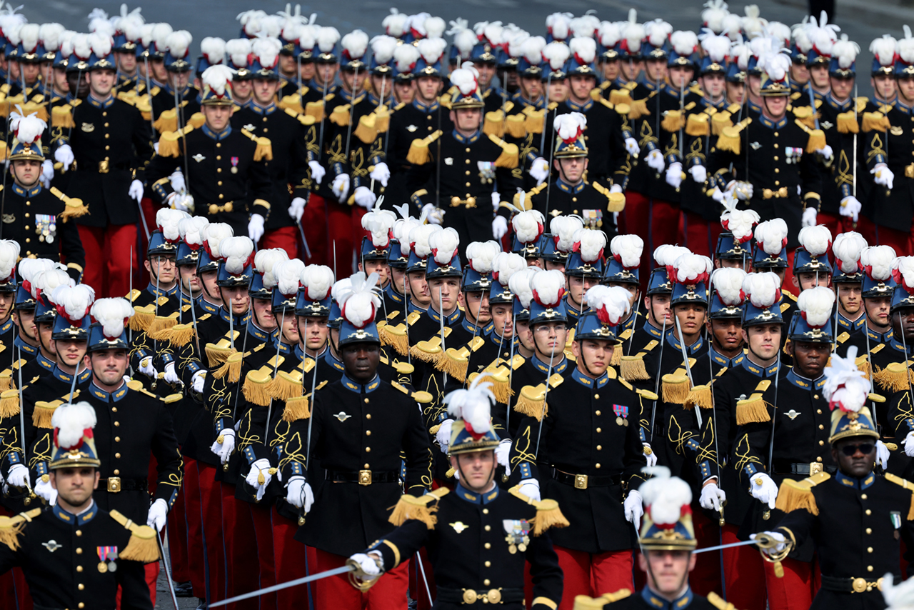 Bastille Day military parade yields Macron promises on defence spending