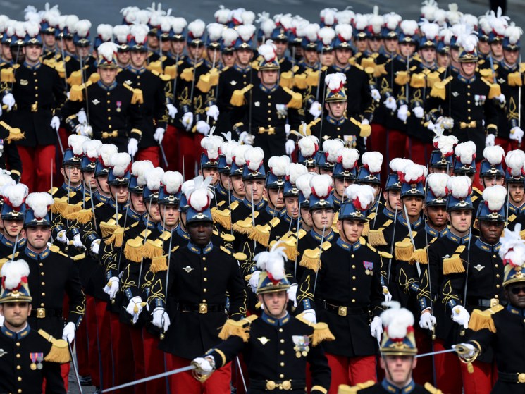 Bastille Day military parade yields Macron promises on defence spending
