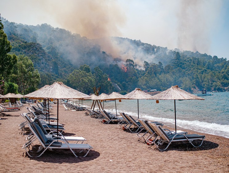 Paradise lost: A 2021 wildfire burns by a resort in Marmaris, Turkey