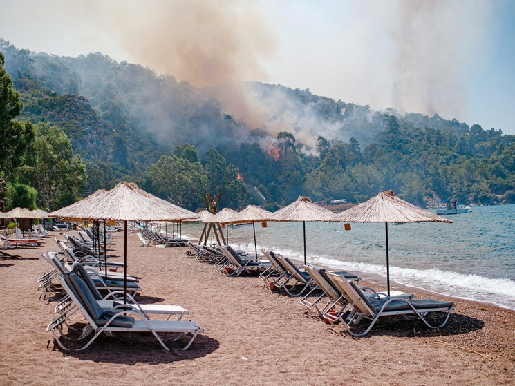 Paradise lost: A 2021 wildfire burns by a resort in Marmaris, Turkey