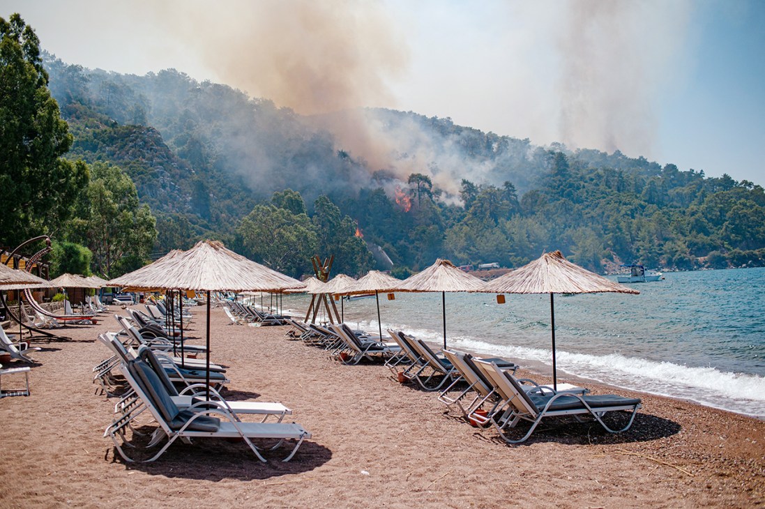Paradise lost: A 2021 wildfire burns by a resort in Marmaris, Turkey