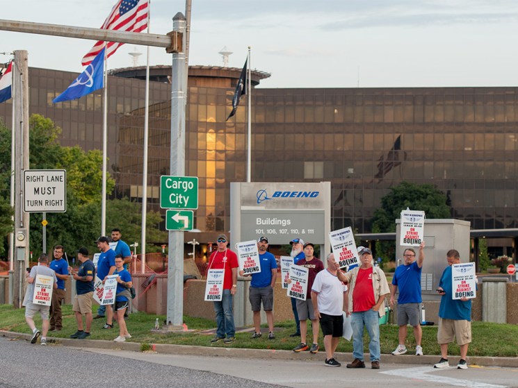 Boeing defence workers go on strike in the latest blow to aviation giant