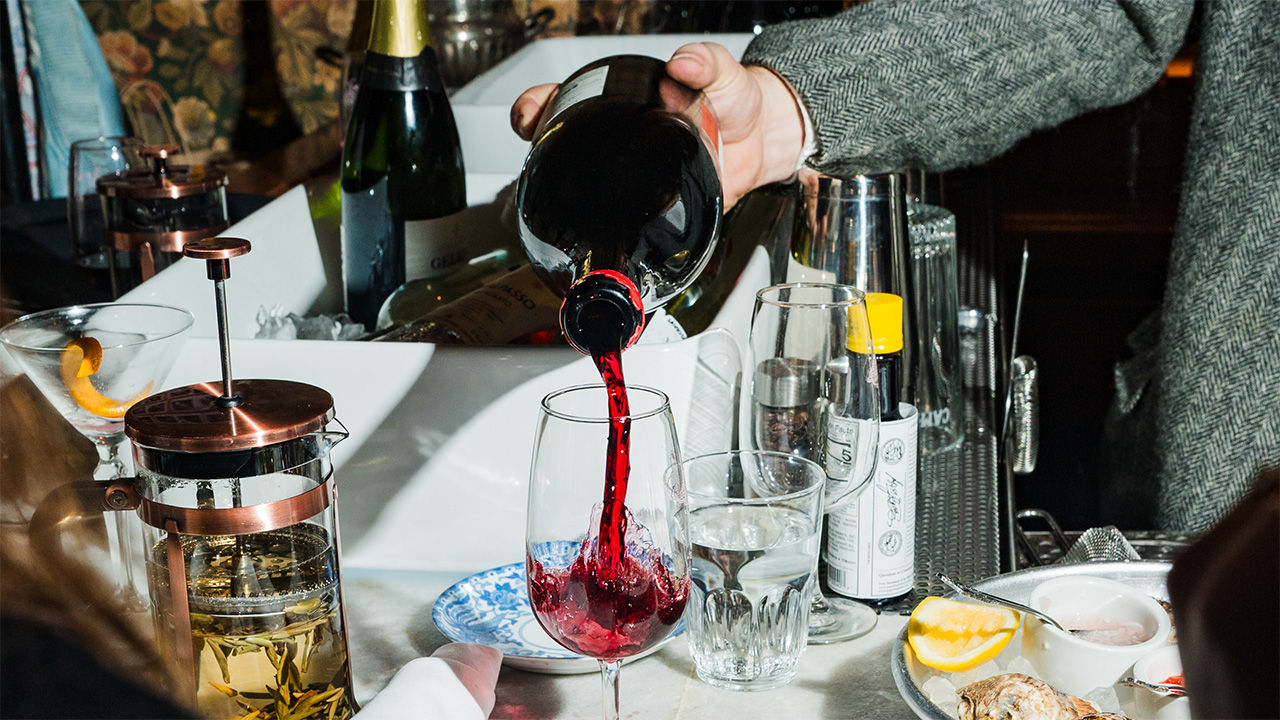 Red wine being poured