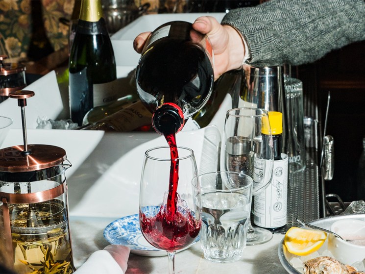Red wine being poured