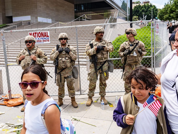 On the defensive: National Guards outside a federal building during the ‘No Kings’ protest in Los Angeles (Image: Getty)