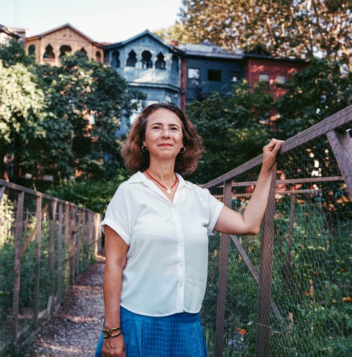 Food writer Nazli Piskin at the Kuzguncuk Bostan (The Gardens of Kuzguncuk). Local residents participate in lottery to be alotted a land plot with an orchard to cultivate vegetables and greens. Istanbul, Turkey