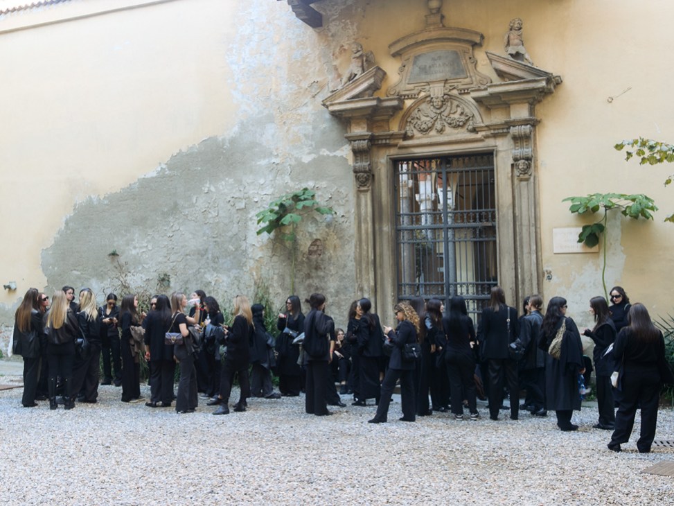 Guests gather in the courtyard at Giorgio Armani’s farewell show at Milan Fashion Week