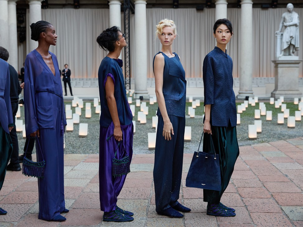 Models wear evening wear in nocturnal blue at Giorgio Armani’s farewell show at Milan Fashion Week
