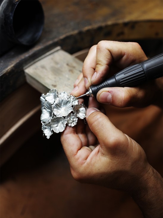Artisan making a Fleur de Pavot cuff at Goossens the jewellery maker