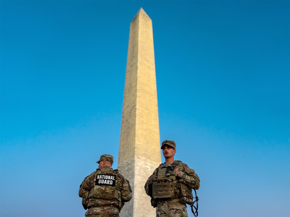 Members of the National Guard standing near the Washington Monument