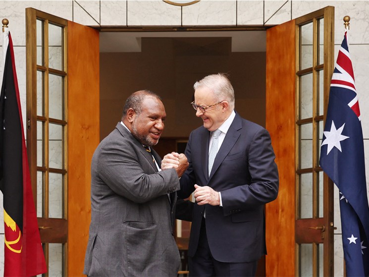 Australia's Prime Minister Anthony Albanese greets Papua New Guinea's Prime Minister James Marape before a signing ceremony at Parliament House in Canberra