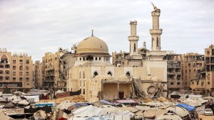 Tents sheltering people displaced by war are pitched near the heavily-damaged Sheikh Hamad bin Khalifa Al-Thani mosque at the Qatari-built Hamad City residential complex in northwestern Khan Yunis
