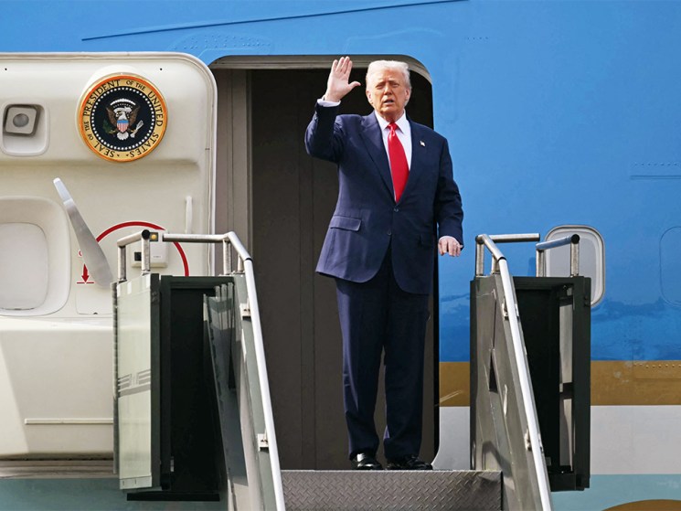 Trump returns from Asia to face Venezuela dilemma 