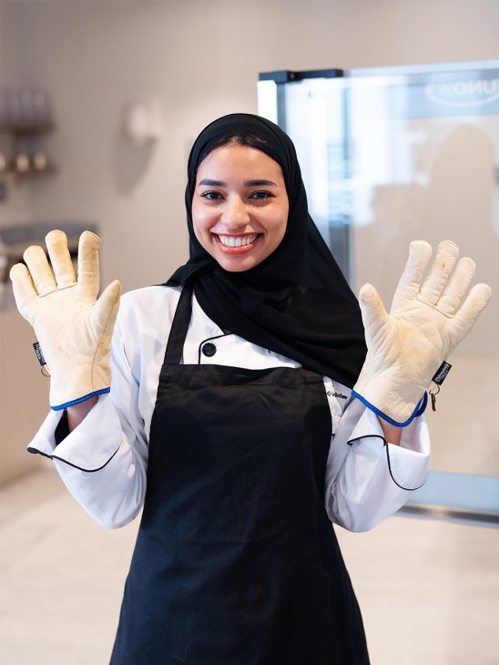 A culinary student at Les Roches Abu Dhabi
