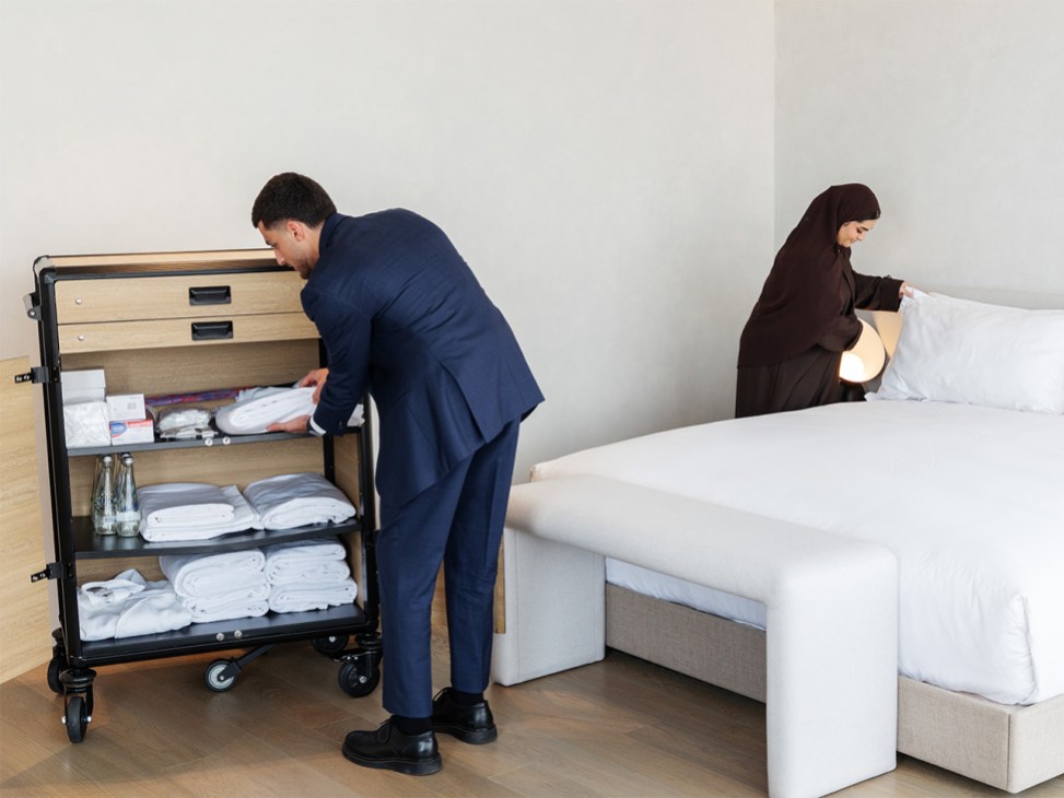 Students learn five-star standards for maintaining hotel rooms at Les Roches, Abu Dhabi