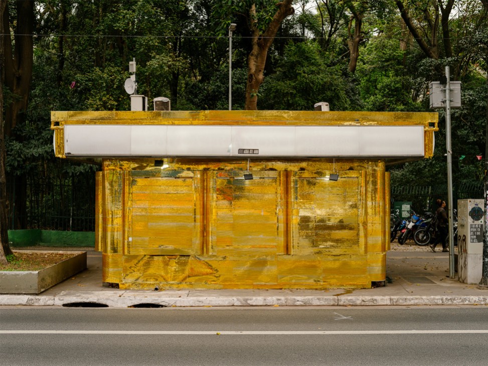 Newsstand on Avenida Paulista covered with golden mirrors by artist Rizza