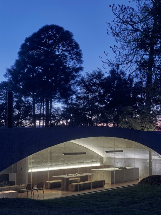 The Hill in Front of the Glen by HW Studio is set in a wooded enclave