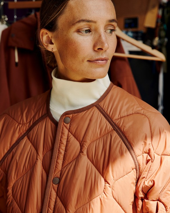 Model wears Amy Powney x Finisterre jacket